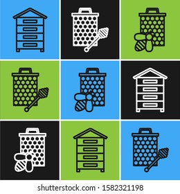 Set line Hive for bees, Bee and honeycomb and Honeycomb with honey dipper stickicon icon. Vector