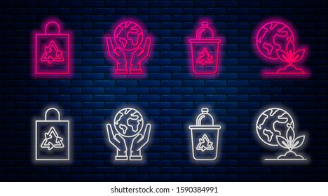 Set line Human hands holding Earth globe, Recycle bin with recycle symbol, Plastic bag with recycle and Earth globe and plant. Glowing neon icon on brick wall. Vector