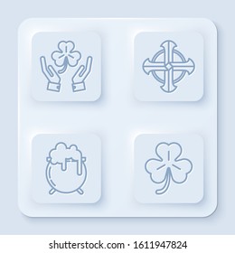 Set line Human hands holding four leaf clover, Celtic cross, Witch cauldron and Four leaf clover. White square button. Vector