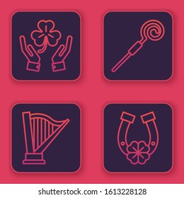 Set line Human hands holding four leaf clover, Harp, Walking stick and Horseshoe with four leaf clover. Blue square button. Vector