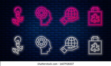 Set line Human head with gear inside, Human hands holding Earth globe, Light bulb with leaf and Paper shopping bag with recycle. Glowing neon icon on brick wall. Vector