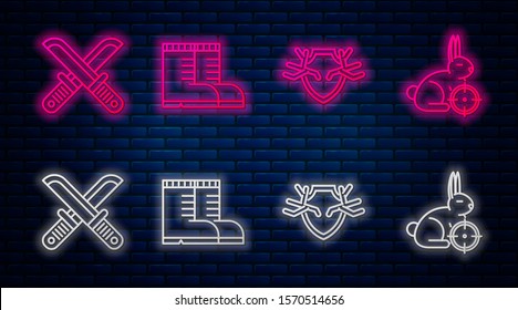 Set line Hunter boots, Deer antlers on shield, Crossed hunter knife and Hunt on rabbit with crosshairs. Glowing neon icon on brick wall. Vector