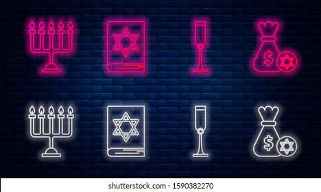 Set line Jewish torah book, Jewish goblet, Hanukkah menorah and Jewish money bag with star of david and coin. Glowing neon icon on brick wall. Vector