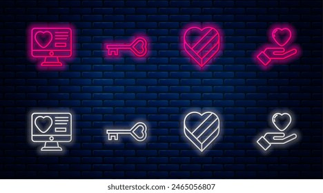 Set line Key in heart shape, Candy shaped box, Dating app online and Heart hand. Glowing neon icon on brick wall. Vector
