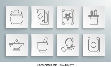 Set line Magic lamp or Aladdin, Playing cards, mortar and pestle, ball on hand, Ancient magic book, Magician hat rabbit ears and Witch cauldron icon. Vector