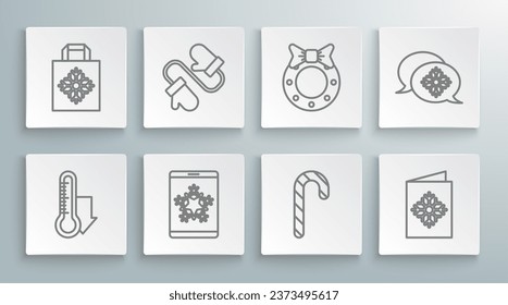 Set line Meteorology thermometer measuring, Christmas on smartphone and snowflake, candy cane with stripes, postcard, wreath, Snowflake speech bubble and paper shopping bag icon. Vector
