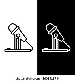 Set line Microphone icon isolated on black and white background. On air radio mic microphone. Speaker sign.  Vector Illustration