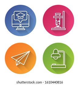 Set line Monitor with graduation cap, Glass test tube flask on fire, Paper airplane and Table lamp. Color circle button. Vector
