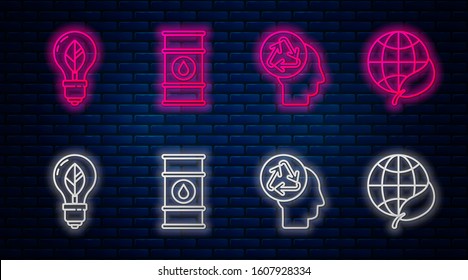 Set line Oil barrel line, Human head with recycle, Light bulb with leaf and Earth globe and leaf. Glowing neon icon on brick wall. Vector