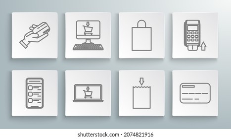 Set line Online shopping on mobile phone, Shopping cart screen computer, laptop, Paper bag, Credit card, Pos terminal with inserted credit and Human hand holding icon. Vector