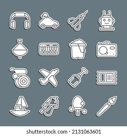 Set line Paint brush, Circus ticket, Photo camera, Dart arrow, Music synthesizer, Whirligig toy, Headphones and Sand bucket icon. Vector