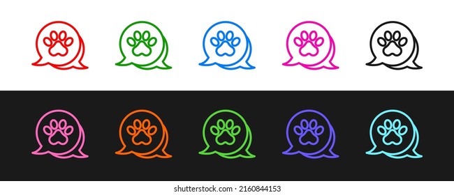 Set line Paw print icon isolated on black and white background. Dog or cat paw print. Animal track.  Vector