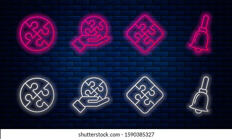 Set line Piece of puzzle in hand, Piece of puzzle, Piece of puzzle and Ringing bell. Glowing neon icon on brick wall. Vector