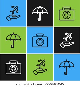 Set line Plane in hand, First aid kit and Umbrella icon. Vector