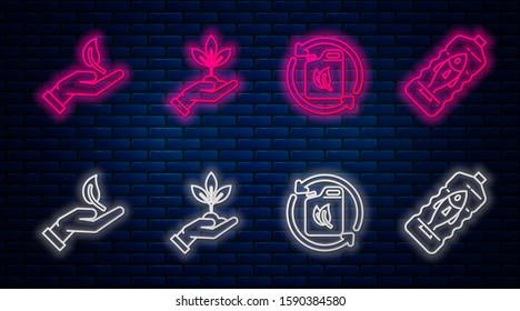 Set line Plant in hand of environmental protection, Bio fuel canister, Sprout in hand of environmental protection and Stop ocean plastic pollution. Glowing neon icon on brick wall. Vector