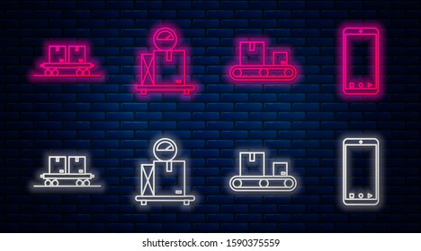 Set line Scale with cardboard box , Conveyor belt with cardboard box , Railway carriage  and Mobile phone with app delivery tracking. Glowing neon icon on brick wall. Vector