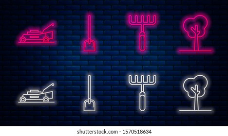 Set line Shovel, Garden rake, Lawn mower and Tree. Glowing neon icon on brick wall. Vector