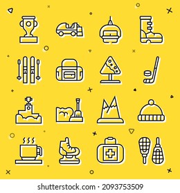 Set line Snowshoes, Winter hat, Ice hockey stick and puck, Ski lift, Sport bag, sticks, Award cup and Road sign avalanches icon. Vector
