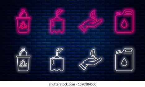 Set line Sprout in bottle, Sprout in hand of environmental protection, Recycle bin with recycle symbol and Canister for gasoline. Glowing neon icon on brick wall. Vector