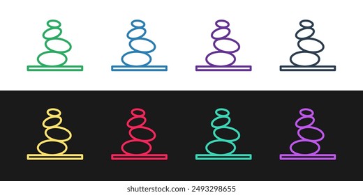 Set line Stack hot stones icon isolated on black and white background. Spa salon accessory.  Vector