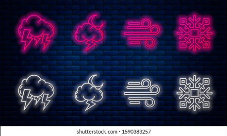 Set line Storm, Wind, Storm and Snowflake. Glowing neon icon on brick wall. Vector