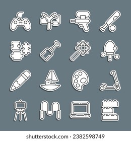 Set Line Spielzeugbausteine, Roller Roller Roller, Racket, Wasserpistole, Shovelspielzeug, Puzzleteile, Gamepad und Rattle Baby Symbol. Vektorgrafik