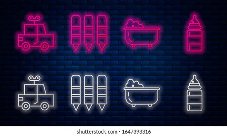 Wax Crayons zum Zeichnen, Babywanne, Spielzeugwagen und Babyflasche. Leuchtendes Neonsymbol an der Ziegelwand. Vektorillustration