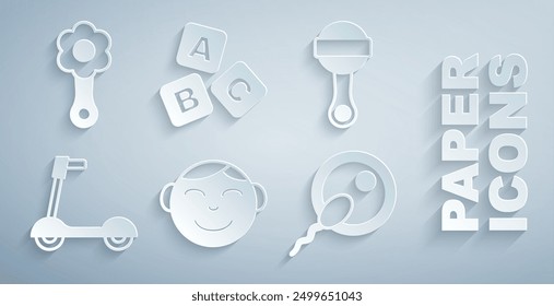 Conjunto Cabeza de niño pequeño, juguete de bebé Rattle, patinete, esperma, bloques ABC e icono. Vector