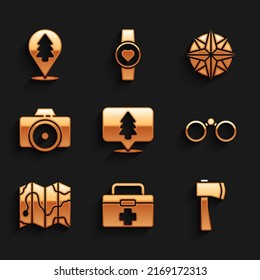 Set Location of the forest, First aid kit, Wooden axe, Binoculars, map, Photo camera, Wind rose and  icon. Vector