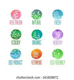 Set of logos, icons, labels, stickers or stamps. Silhouettes of twigs, leaves, plants, berries. Colored watercolor texture. Vector