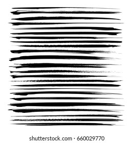 Set of long black textured abstract strokes isolated on a white background