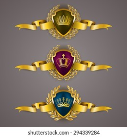 Set of luxury golden vector shields with laurel wreaths, crowns, ribbons. Royal heraldic emblem, icons, label, badge, blazon, monogram for web, page design. Vector illustration EPS 10.