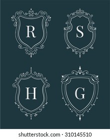 Set of luxury premium stylish templates in the form of a decorative medieval heraldic shields. Hotel, boutique, jewelry sign. Wedding, invitation, logo design. Borders, frames, labels in retro style.