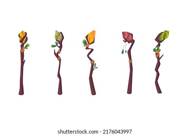 
A set of magic staffs or wands for wizards, with precious stones. A set of cartoon vector illustrations.