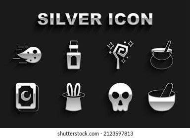 Set Magician hat and rabbit ears, Witch cauldron, Skull, Tarot cards, staff, Fireball and Bottle with potion icon. Vector