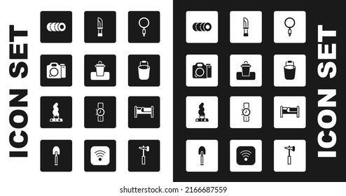 Set Magnifying glass, Trash can, Photo camera, Blanket roll, Bucket, Knife, Bed and Campfire icon. Vector
