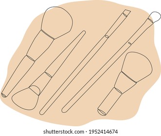 A set of makeup brushes. Line art image. One Line illustration.