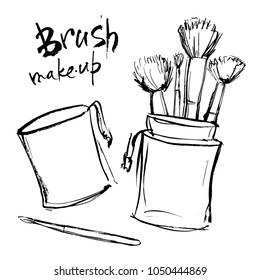 A set of makeup brushes in the tube.