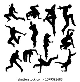 A set of male street dance hip hop dancers in silhouette
