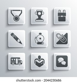 Set Man reading book, Speech bubble chat, Paper clip, Ringing alarm bell, School Bus, Pencil with eraser, Medal and backpack icon. Vector