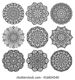 Set of mandalas for coloring book. Decorative round ornaments. Anti-stress therapy patterns. Weave design elements. Yoga logos, backgrounds for meditation poster. Unusual flower shape. Oriental vector