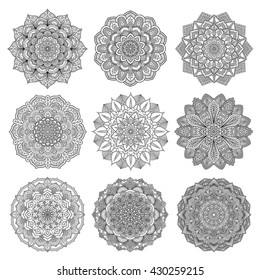 Set of mandalas for coloring book. Decorative round ornaments. Anti-stress therapy patterns. Weave design elements. Yoga logos, backgrounds for meditation poster. Unusual flower shape. Oriental vector