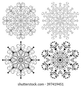 Set of mandalas. Symmetry round flower patterns. Black and white circle decorative elements in vector for design. 