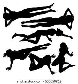 Set of many black vector silhouettes of women in different lying and sitting poses. Black profile of slim woman body isolated on white background. Beautiful sexy girl on the beach bird view. 
