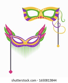 Set of Mardi Gras carnival masks with various decorations on stick. Flat hand drawn holiday object. Festival dressing for the face. Vector object separate from the background.