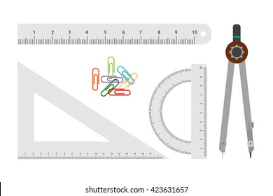 Set for mechanical drawing: ruler, protractor, triangle, compasses and paper clips
