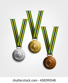 set of medals in gold,silver and bronze for winner in sports games.