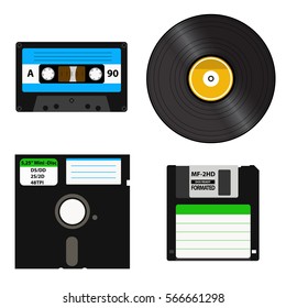 Set of media of different generations: vinyl record, cassette tape, a 3.5-inch floppy disk on a 5.25-inch diskette. Isolated on white background.