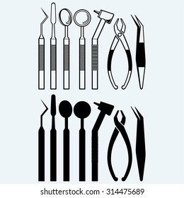 Set of medical equipment tools for teeth dental care. Isolated on blue background