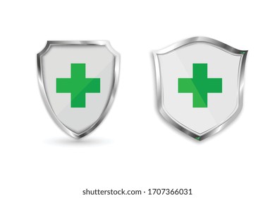 Set medical health protection shield with green cross. Protected steel guard shield concept. Security safeguard metal label. Vector illustration.